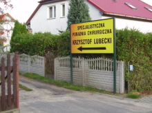 powiększ